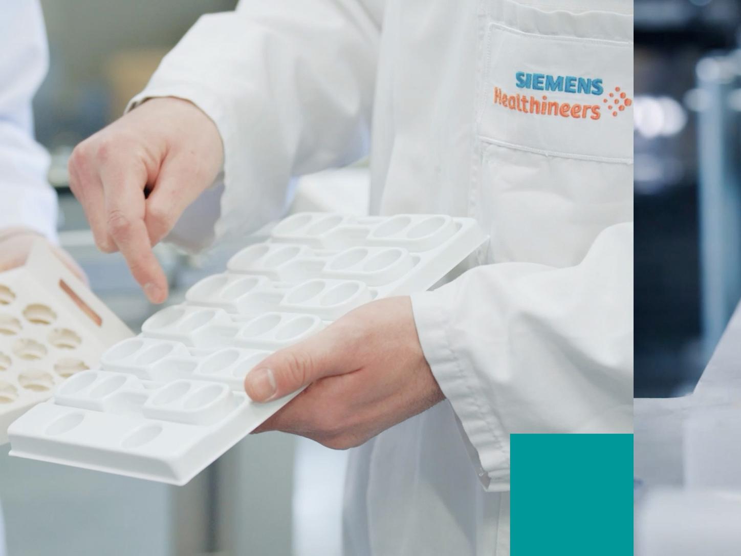 person holding packaging for medical supplies