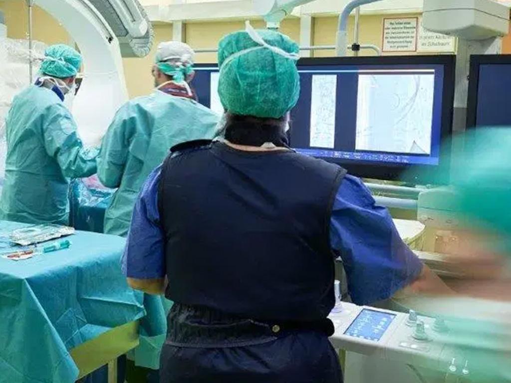 Doctors working in an operating room.