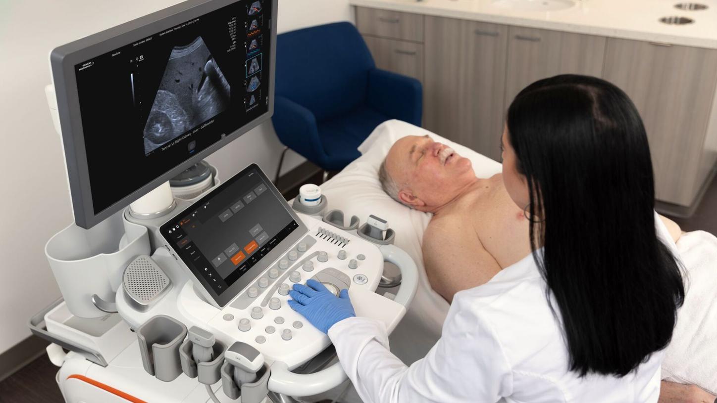 Physician examining a patient using Ultrasound Derived Fat Fraction on the ACUSON Sequoia