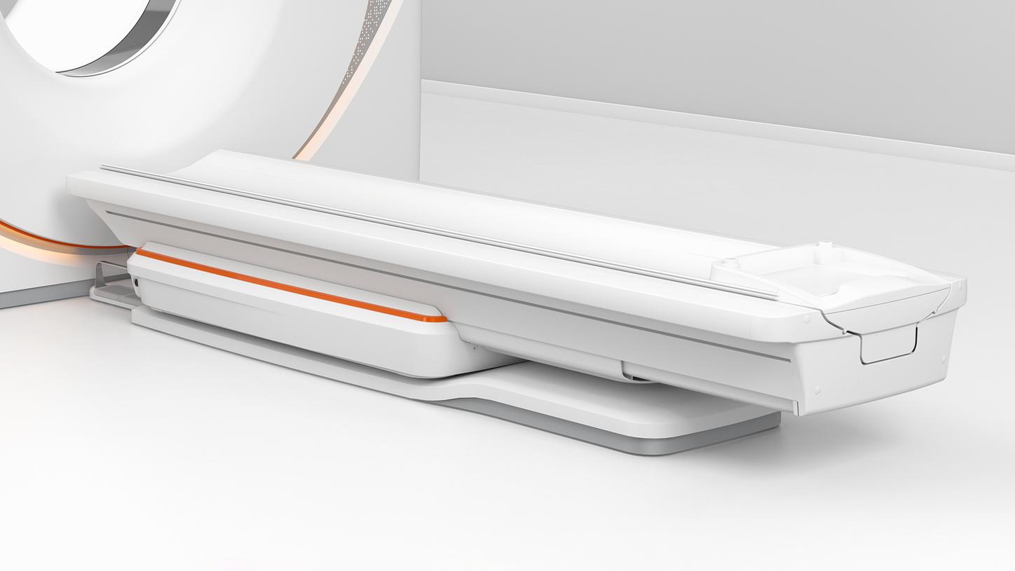 Image of the NAEOTOM Alpha and its multipurpose patient table in the lowest position: The table can go as low as 38 cm for easier patient access.